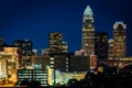 View Of The Skyline Of Uptown At Night, In Charlotte, North Carolina.