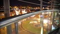 View from skyscraper at night city, hectic urban life in illuminated megalopolis