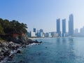 View of the skyscrapers of Busan and Haeundae beach from the sea.