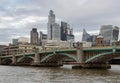 View of Skyscrapers and Southwark bridge in the business district over River thames in city of london Royalty Free Stock Photo