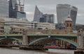 View of Skyscrapers and Southwark bridge in the business district over River thames in city of london Royalty Free Stock Photo