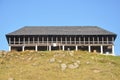 View of slate roofed old wooden home in mountain of Himachal Pradesh