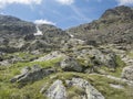 View on slope of mountain peak ridge at Niederl saddle at Stubai hiking trail, Stubai Hohenweg, Summer rocky alpine Royalty Free Stock Photo