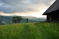 View of the slopes of the mountains, old hut