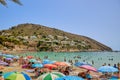 View of a small beautiful sandy beach with clear turquoise water