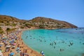 View of a small beautiful sandy beach with clear turquoise water Royalty Free Stock Photo