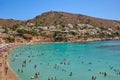 View of a small beautiful sandy beach with clear turquoise water