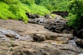 view small canal above waterfall is dry with stone Royalty Free Stock Photo