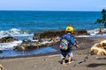 View of a small child jogging on Cacalan beach, Banyuwangi Royalty Free Stock Photo