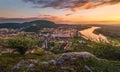 View of Small City with River from the Hill at Sunset Royalty Free Stock Photo