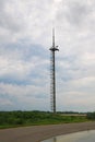 View of a small communications tower on a cloudy day Royalty Free Stock Photo