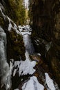 View from small footbridge over mountain river between high rocks Royalty Free Stock Photo