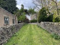 Grass track, leading to Baxter Wood, in the village of, Glusburn, Yorkshire, UK