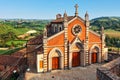 Small church and green hills in Piedmont, Italy. Royalty Free Stock Photo