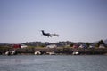 View of Small private jet airplane landing