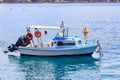 View of a small rescue boat with a powerful motor on the background of the beach coastline