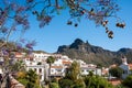 Lanscape view of small spanish town of Tejeda in gran canaria island on mountain valley on summer day with view of bentayga rock