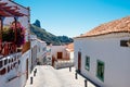 Lanscape view of small spanish town of Tejeda in gran canaria island on mountain valley on summer day with view of bentayga rock