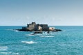 View of the small tidal island of Grand Be in the English Channel by Saint-Malo and sea kayakers