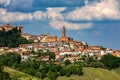 Small town of Govone on the hill in Italy. Royalty Free Stock Photo