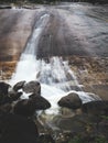 panoramic view of a rain forest waterfall Royalty Free Stock Photo