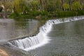 View of small waterfall on public parks lake, in Tomar, Portugal Royalty Free Stock Photo