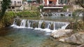 View of a small waterfall in a river in Greece