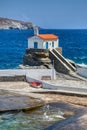 A small white church on the  beach, Andros, Cyclades, Greece Royalty Free Stock Photo