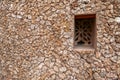 View of a small window on a traditional Swahili wall in Lamu Island, Kenya