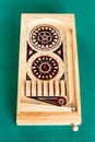 View of small wooden vintage pinball game on table Royalty Free Stock Photo