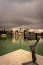 View of a smartphone doing a timelapse on an image stabilizer, in the Retiro Park in Madrid. Vertical view. Travel concept