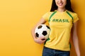 View of smiling female football fan Royalty Free Stock Photo