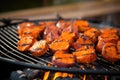 view of smoky barbecue with sweet potatoes