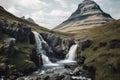 a view of the snow-capped mountains, with a waterfall cascading down its flank Royalty Free Stock Photo