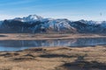 View of snow-capped Reynisfjall mountains from Dyrholaey, Iceland