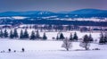 View of snow-covered farm fields and distant mountains from Long Royalty Free Stock Photo