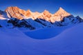 View of snow covered landscape with Dent Blanche mountains and Weisshorn mountain in the Swiss Alps near Zermatt. Panorama Royalty Free Stock Photo