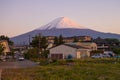 View of snow covered Mount Fuji in calm spring evening