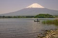 View of snow covered Mount Fuji and lake Kawaguchiko