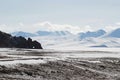 View of snow-covered Nyenchen Tanglha Mountains in mid October from Namtso Lake, Damxung County, Tibet Autonomous Region Royalty Free Stock Photo