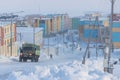 View of the snow-covered street of the northern arctic city.