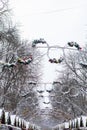 view of snowed roofs of christmas village at city square