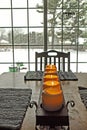 View of Snowstorm from inside of home looking Out.  Candles lit on table. Royalty Free Stock Photo