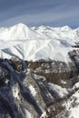 View of the snowy mountain range, Georgia. Landscape. High mountains under snow and blue sky. Panorama of the white mountains in Royalty Free Stock Photo