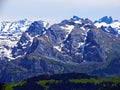 View of the snowy peaks and glaciers of the Swiss Alps from the Pilatus mountain range in the Emmental Alps, Alpnach - Switzerland Royalty Free Stock Photo