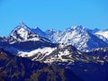 View of the snowy peaks and glaciers of the Swiss Alps from the Pilatus mountain range in the Emmental Alps, Alpnach - Switzerland Royalty Free Stock Photo