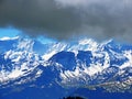 View of the snowy peaks and glaciers of the Swiss Alps from the Pilatus mountain range in the Emmental Alps, Alpnach - Switzerland Royalty Free Stock Photo