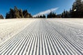 View of a snowy ski resort piste in the early morning Royalty Free Stock Photo