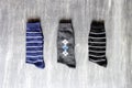 View of socks different colors and styles on vintage gray background