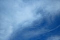 SOFT WHITE WISPY CLOUD VAPOUR AND BLUE SKY